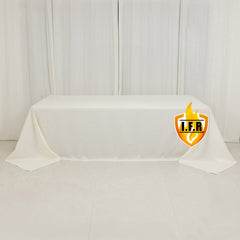 Fire Retardant Premium Polyester 90"x156" Rectangular Tablecloth Ivory - High-Performance Seamless Table Cover